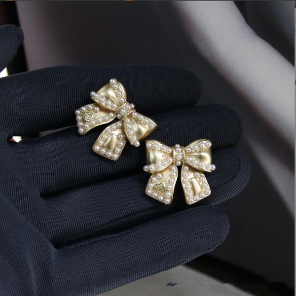 Lampadario pendente Dolci orecchini di perle con papillon dal temperamento versatile per aghi d'argento 925 da donna
