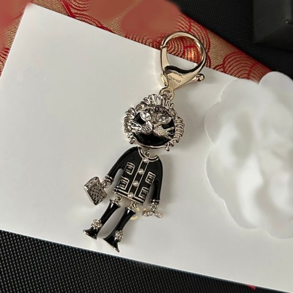 Estilo de luxo chaveiro chave marca designers figura dos desenhos animados chaveiros para homens mulheres cobre carro bolsa pingente colhedores acessórios