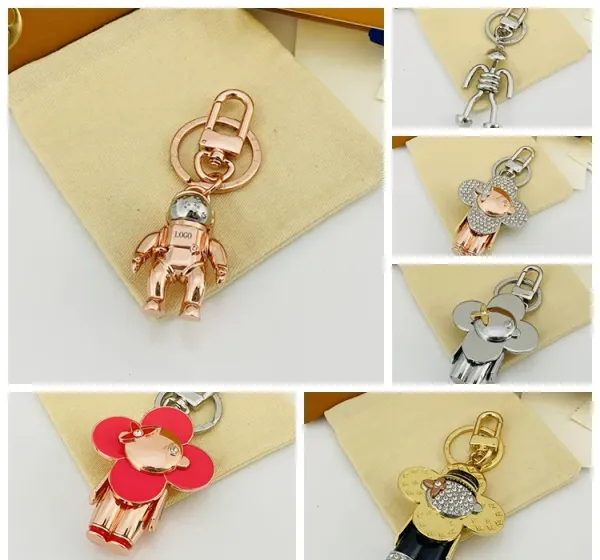 Designer Cartoon Schlüsselanhänger Luxus Damen Herren Schlüsselanhänger Hochwertiger Auto Schlüsselanhänger Liebhaber Gold Schwarz Metall Kleiner Schmuck Charm Taschenanhänger Schmuck Gutes Geschenk 2311175D