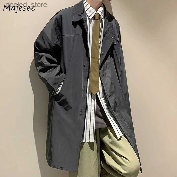 Trench da uomo Uomo Nero Trench lungo Colletto rovesciato Cappotti con cerniera Vintage Chic Cargo Bello Giacca a vento Maschile Casual Streetwear Autunno S-3XL Q231118