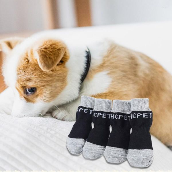 Dog Apparel 4pcs / lot Welpen-Katze gestrickte Socken beschuht reizende warme rutschfeste nette Karikatur-Druck-Katzen-Hundeaufladungs-Winter-Fußbekleidung