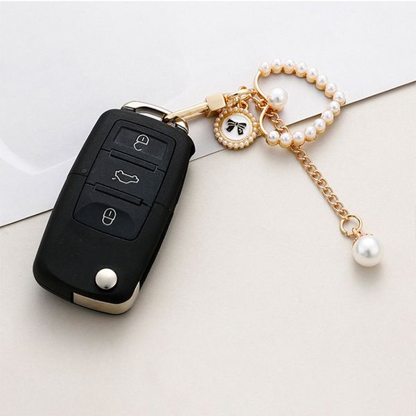 Bonito chaveiro pérola coração chaveiro bonito arco pendente para mulheres meninas fone de ouvido caso chaveiro do carro jóias acessórios do carro