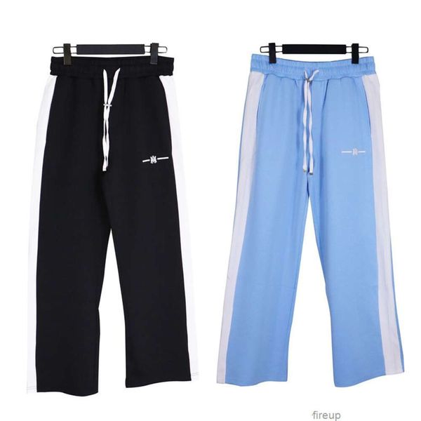 Tasarımcılar Sıradan Pantolon Erkek Pantolon Swearpants Amires 2023 İlkbahar/Yaz Yeni Siyah Beyaz Renkli Blok Mektup Baskı Yüksek Sokak Çılaştı Spor Pantolon UNISEX