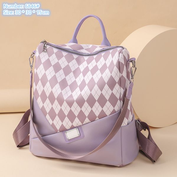 Mochila de ombro por atacado de fábrica 3 cores Backpack de couro leve e macia Backping Small Fresh Contraste Bolsa Impressa Trend rômbica Mochilas 6846#