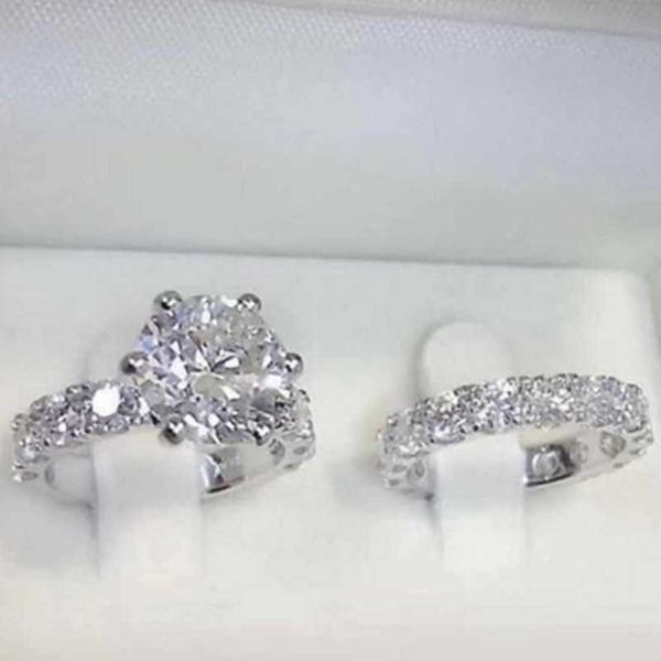 Anelli a fascia 2 pezzi Set colore argento set di anelli di fidanzamento per matrimonio da donna stile elegante strass bianco zircone gioielli classici in cristallo AA230417