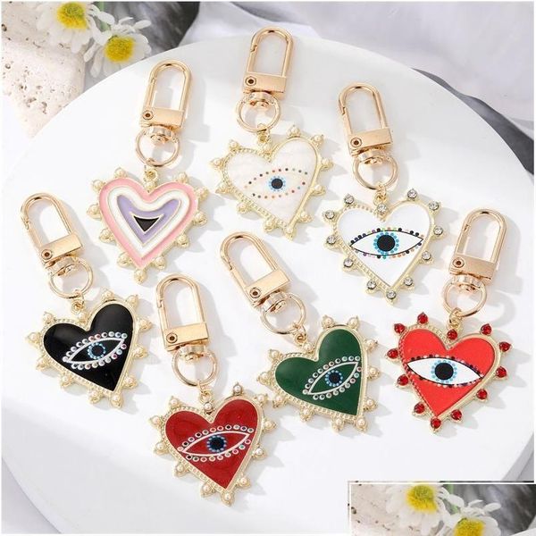 Anahtarlıklar Landards Keychains Landards Rhinestones Pearl Evil Gözler Alaşım Erkek Kadınlar Şeftali Aşk Kalp Şeytanları Bag Araba Anahtar Yüzme Kolye I DHEIO