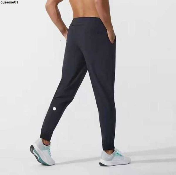 Erkek limon tozlukları hizalanan pantolon yoga kıyafeti spor hızlı kuru çizim sporu cepleri eşofmanlar pantolonlar erkek gündelik elastik bel tasarımcısı moda markası