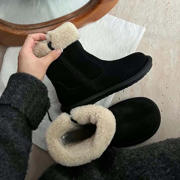 Stivali da neve Martin con fondo piatto in pelle scamosciata di alta qualità da donna alla caviglia di design 01