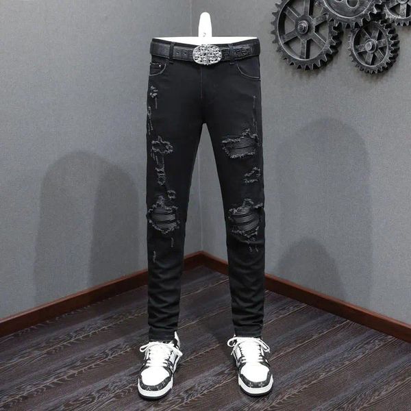 Jeans da uomo Moda Streetwear Uomo Nero Stretch Skinny Strappato Pantaloni alla moda Pantaloni di marca Hip Hop firmati con toppe in pelle