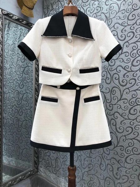 Vestidos de trabalho 2023 moda feminina terno preto e branco cor combinando curto topo saia de cintura alta conjunto de 2 peças 0517