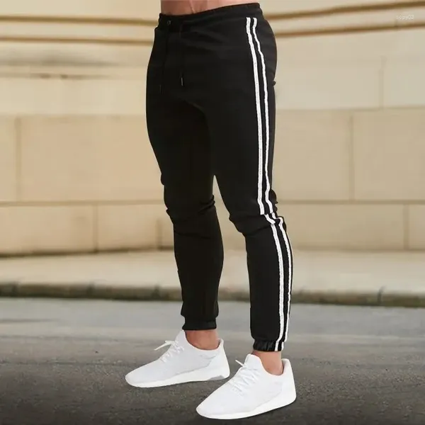 Calças masculinas primavera e outono casual 2023 tendência versão coreana preto branco listras magro legging pés encadernados