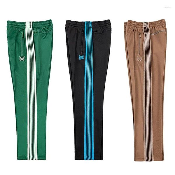 Pantaloni da uomo Pantaloni sportivi in rete AWGE con aghi Abbigliamento da donna Pantaloni sportivi con farfalla ricamata arancione a righe marroni Y2k