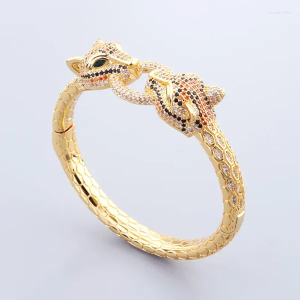 Bracciale Donia Jewelry Bracciale retrò di lusso con zirconi micro-intarsiati in titanio a doppia testa con occhi verdi e leopardo