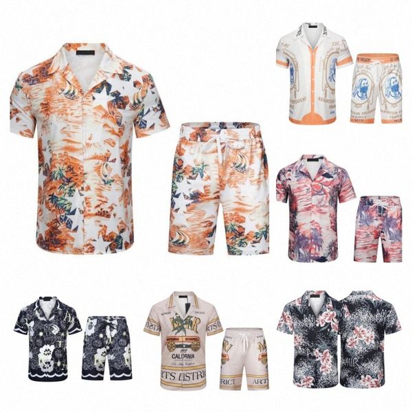 23SS Дизайнерская рубашка Мужчина пуговица на однобортные рубашки Amirs Print Print Рубашка для боулинга Hawaii цветочные повседневные рубашки мужчины песчаные пляжные шорты роскошные высокие высокие Qua G6lo#