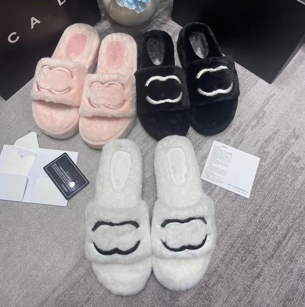 2024 Hausschuhe Wollfell Schaffell Einlegesohle Gleitet Sandalen Flache Slipper Designer Frauen Weiche Winter Luxus Plüsch Fell Oran Gummisohle