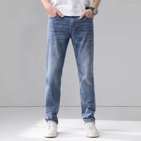 Calças de brim masculinas outono fino ajuste pés elástico tendência edição coreana para homens estiramento em linha reta denim calças masculinas marca plus size 40