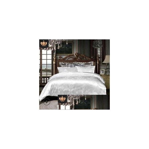 Set di biancheria da letto Trapunte di lusso Letto di design 3 pezzi Set per la casa Lenzuolo piumino jacquard Doppia singola Queen Biancheria da letto king size Consegna di goccia Ga Dhy3S