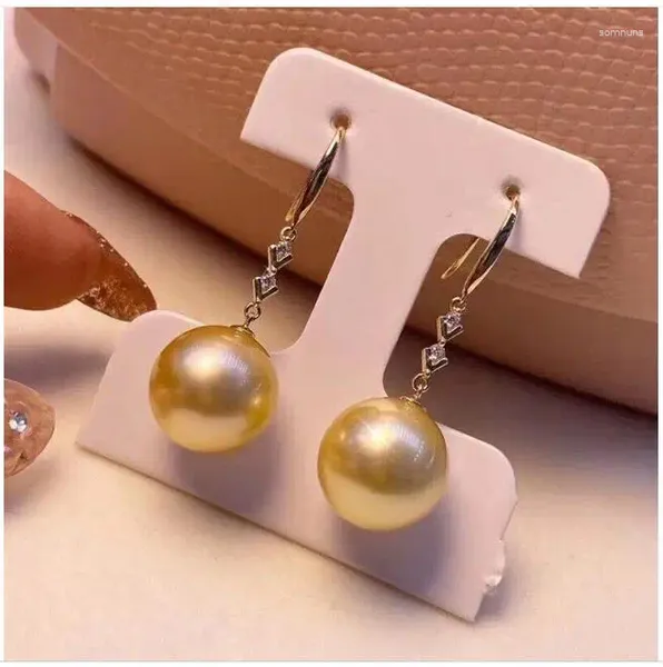 Orecchini pendenti Splendidi enormi orecchini di perle dorate rotonde dei Mari del Sud da 10-11 mm in argento 925