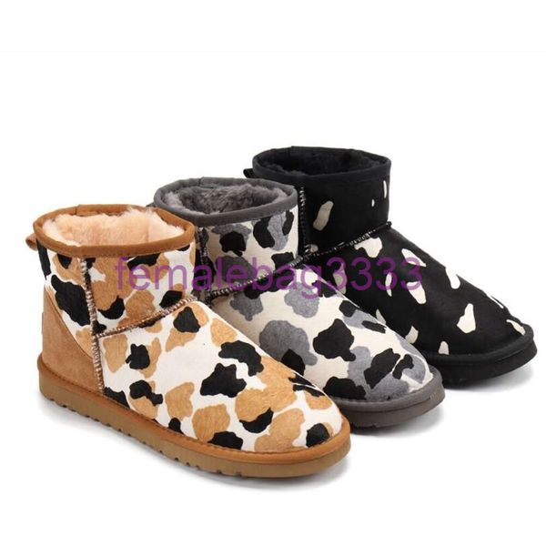 Frauen Kuh Druck Ultra Mini Schnee Stiefel Slipper U Winter neue beliebte Knöchel Schaffell Pelz Plüsch halten warme Stiefel Designer-Schuhe