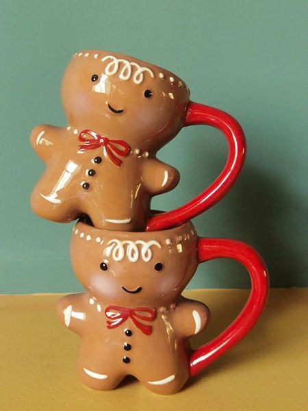 Tazze Tazze in ceramica di Natale Tazza creativa di Natale Cartone animato Omino di pan di zenzero Tazza di caffè Coppia Regali di Natale Regali di Natale Navidad Drink Cups 231122