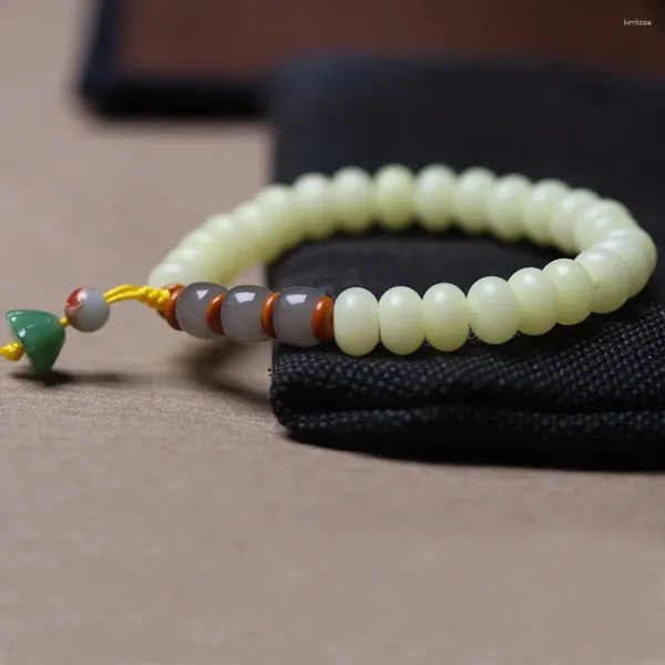 Charm-Armbänder, natürliche Verwitterung, gelbe Bodhi-Wurzel mit Olivenkernstücken, Lotus-Zubehör, weißes Jade-Buddha-Perlenarmband