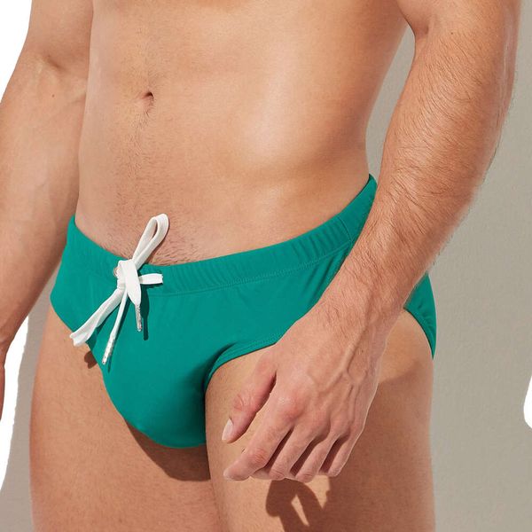 Costume da bagno sexy da uomo Protezione rimovibile Imbottiture anteriori Costume da bagno elastico a vita bassa Cravatte Slip da bagno Costume da bagno solido Abbigliamento da spiaggia