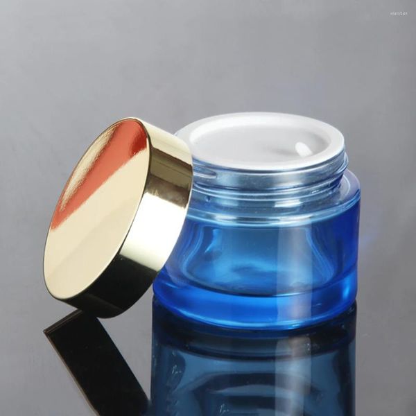 Bottiglie di stoccaggio Fornitori della Cina Barattolo di vetro blu da 50 pezzi con coperchio a vite Confezione cosmetica per crema per il viso vuota da 50 g Oro