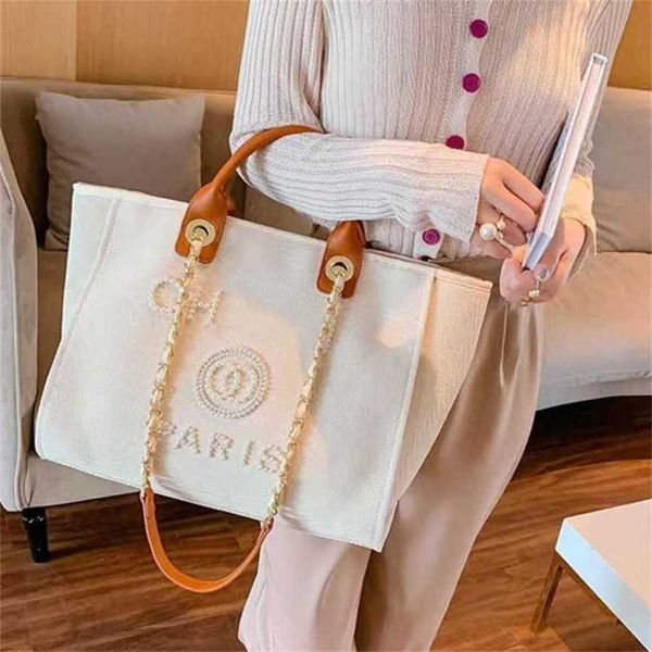 Borse da sera di lusso classiche Borse di marca Borsa da spiaggia in tela di perle Tote Borsa da donna portatile a tracolla di grande capacità Borsa da donna grande O72t all'ingrosso 69FY