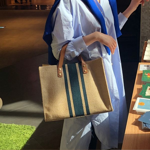 Koreanische Version von Frauen, die Aktenkoffer tragen, professionelles Pendeln, einfache Mode-Segeltuch-Tasche mit großer Kapazität