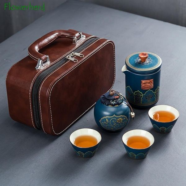 Telefocase in porcellana in ceramica Kung Fu Set di tè per tè per tè da viaggio per tè da viaggio per tè antiscalding una pentola da tre tazze di teiera con filtro