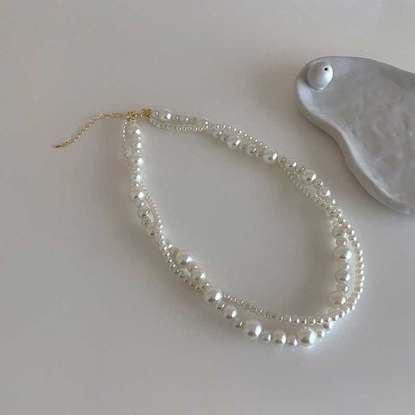 Anhänger Halsketten Kuppelkameras ALLNEWME Elegante doppellagige Imitationsperle Perlenketten für Frauen Großhandel Twist Chain Choker Halskette Casual AA230428