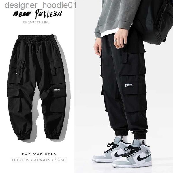 Calças masculinas streetwear preto masculino harem joggers calças calças de carga 2023 hip hop casual bolsos sweatpants oversized moda calças l231129