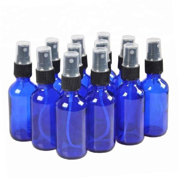 Dicke 50-ml-Sprühflaschen aus kobaltblauem, bernsteinfarbenem Glas für ätherische Öle – mit schwarzen Feinnebelsprühern Hjrnx