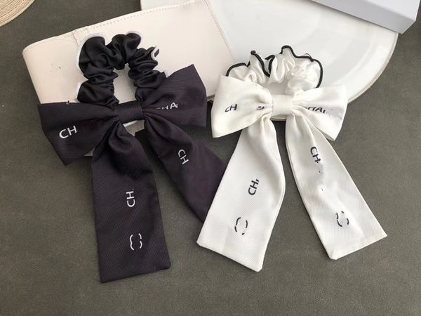 Luxusdesignerin CH-Letter Hair Gummibänder Schwarze weiße Stoff Haar Ring Bow Marke Elegante Seile für Frauen Mädchen Hairjewelry beste Qualität