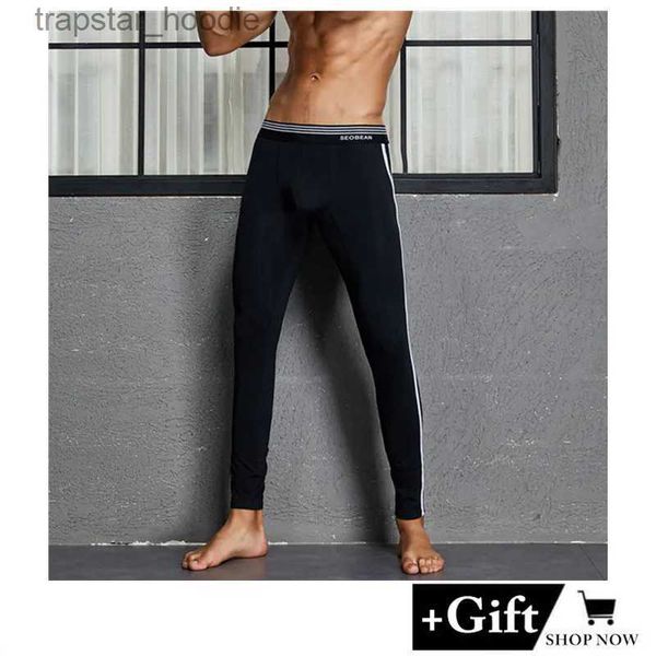 Roupa interior térmica masculina sexy estiramento calças de fitness calças térmicas finas versão coreana calças longas quentes calças esportivas leggings magro longo roupa interior l231130