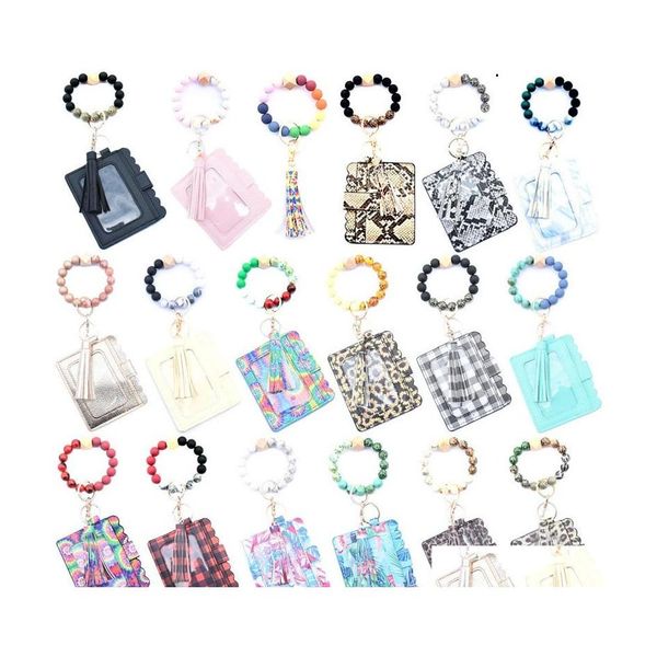 Favor de festas 17 cores Leopard Wrist Car Key Rings With Tassel Banglet Holder Sile Bread Bracelet Bag Wood Wood PU PU CHAURYCH OTRQB