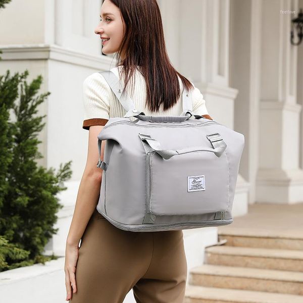 Duffel Bags Большой емкость для путешествий для женщин складные женщины путешествовать по рюкзак спортивной спортивной спортзал йога водонепроницаем