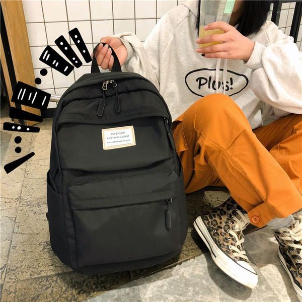 Bolsas escolares de grande capacidade Candy Color Backpack Casual Nylon Women Women feminino coreano Bolsa de viagem adolescente