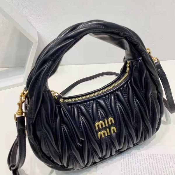 Bolsa de promoção de folga da loja Exportação online 2023 New Miao Family Women's Bag M Body Cross Family Family Blow