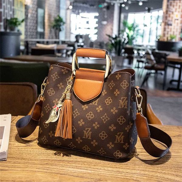 2023 Geldbörsen Ausverkauf Outlet Online-Verkauf Hong Brand Damen-Wasser-Eimer-Tasche New Old Flower Fashion Advanced Sense One-Shoulder-Crossbody-Handtasche