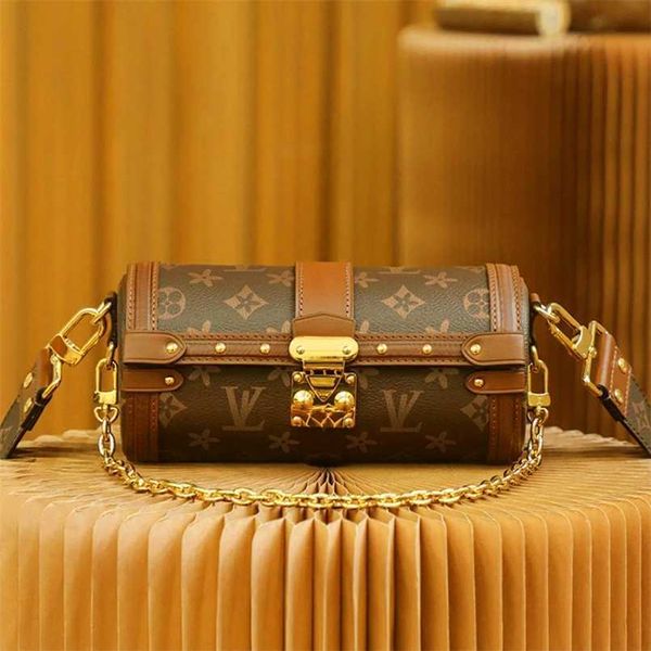 2023 Sacs Outlets Outlets Cylindre babylonien de Ouyang Nana Nouvelle vieille fleur Une chaîne d'épaule Petit sac à bandoulière en cuir pour femme