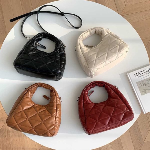 Bolsas de ombro de ombro delicado delicado bolsa de transporte de couro macio com um rhombus lombado diagonal pequeno e versátil moda única para mulheres