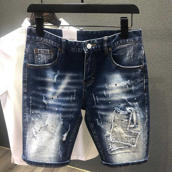 Pantaloncini Abbigliamento uomo pantaloncini di jeans dritti elastico classico blu moda buco patch street hip-hop jeans al ginocchio per uomo Bermuda P230525