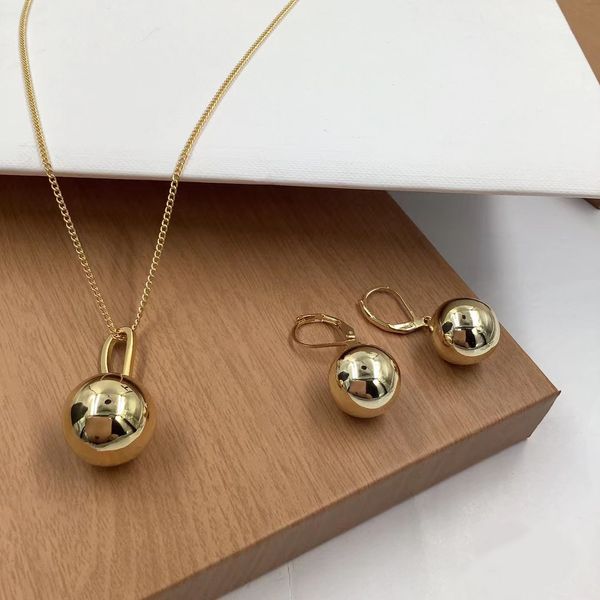18 Karat vergoldete kleine Goldperlen-Halskette und Ohrringe. schillernde kleine goldene Kugeln mit Statement. Schmuck-Luxus-Ohrringe-Designer für Frauen. klassische aretes mit geschenkbox