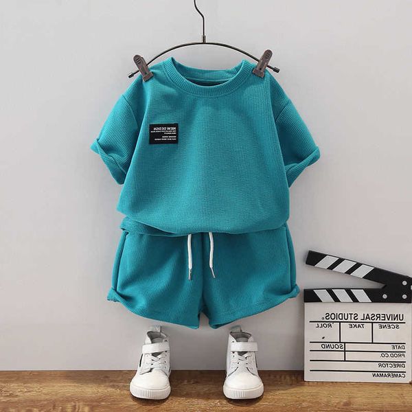 Roupas conjuntos de anos menino de anos simples coreana moda de cor sólida tsshirtbaby shorts de algodão de verão traje infantil roupas de traje para criança roupas