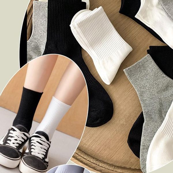 Calzini da donna 1 paio di tubi in cotone tinta unita Set Ins Tide Street Wear All-Match Nero Bianco Sport Long Girls Socket