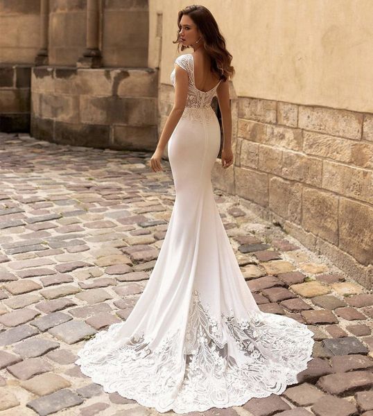 Abiti da festa Splendido scollo a V Mermaid Appliques da sposa Maniche ad aletta Abiti da sposa sexy senza schienale Robe De Lace Court Train 230214