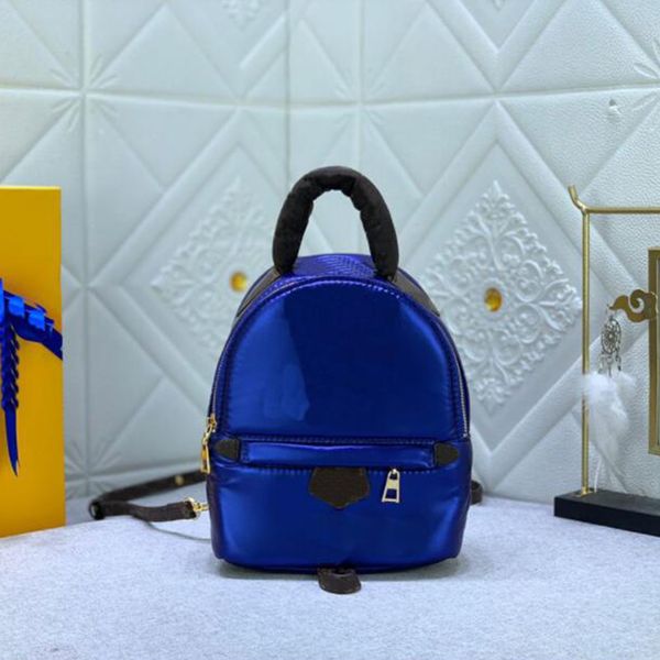 2023 Novo mini -mochila designer de bolsas femininas bolsas de luxo Moda Moda ao ar livre Messenger Messenger Polyamide Canvas Feminino Purse M21060