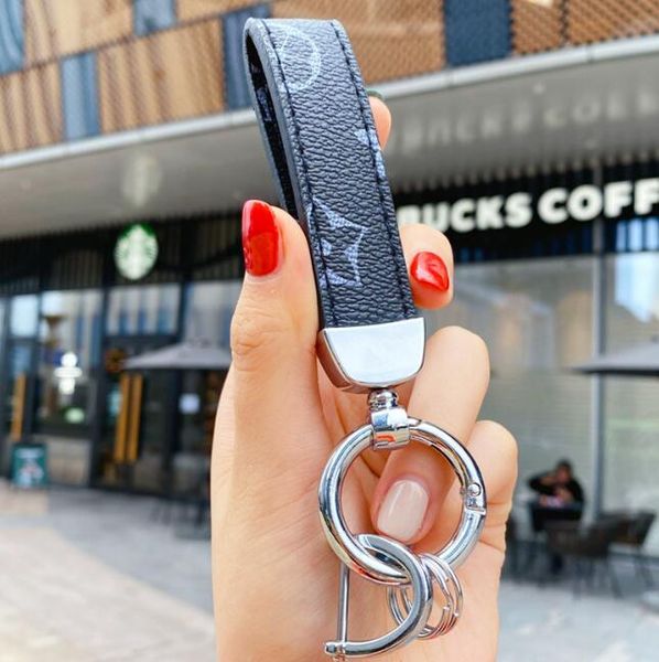 Criatividade Presbyopia Print Car Keychain Bag Pingente Jóia Tecladora de Chavesque para homens Presente Fashion PU Couather Flower Grid Design Metal Key Chain Acessórios