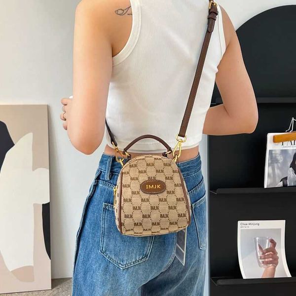 Design piccole borse nuova borsa da donna in tela tendenza cellulare mini secchiello Tibet catene speciali Borsa Outlet vendita di liquidazione